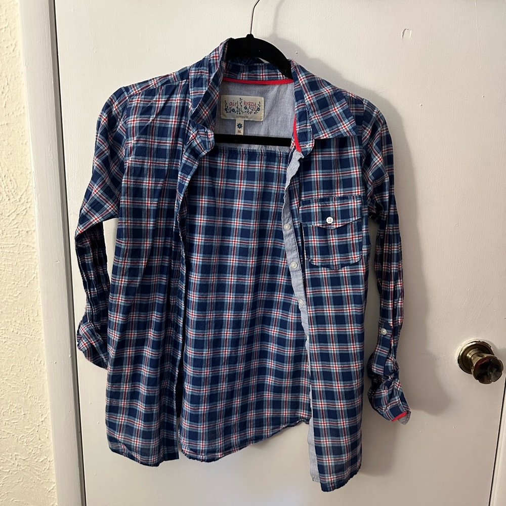 Women’s plaid long sleeve shirt.